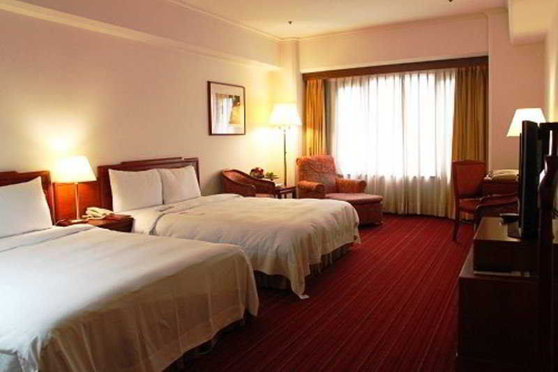The Howard Prince Hotel Taizhong Zewnętrze zdjęcie A room at the hotel